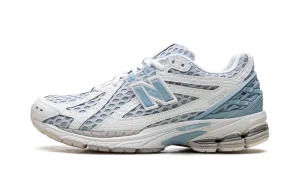 1906R "Chrome Blue" running in wet tracks shoes