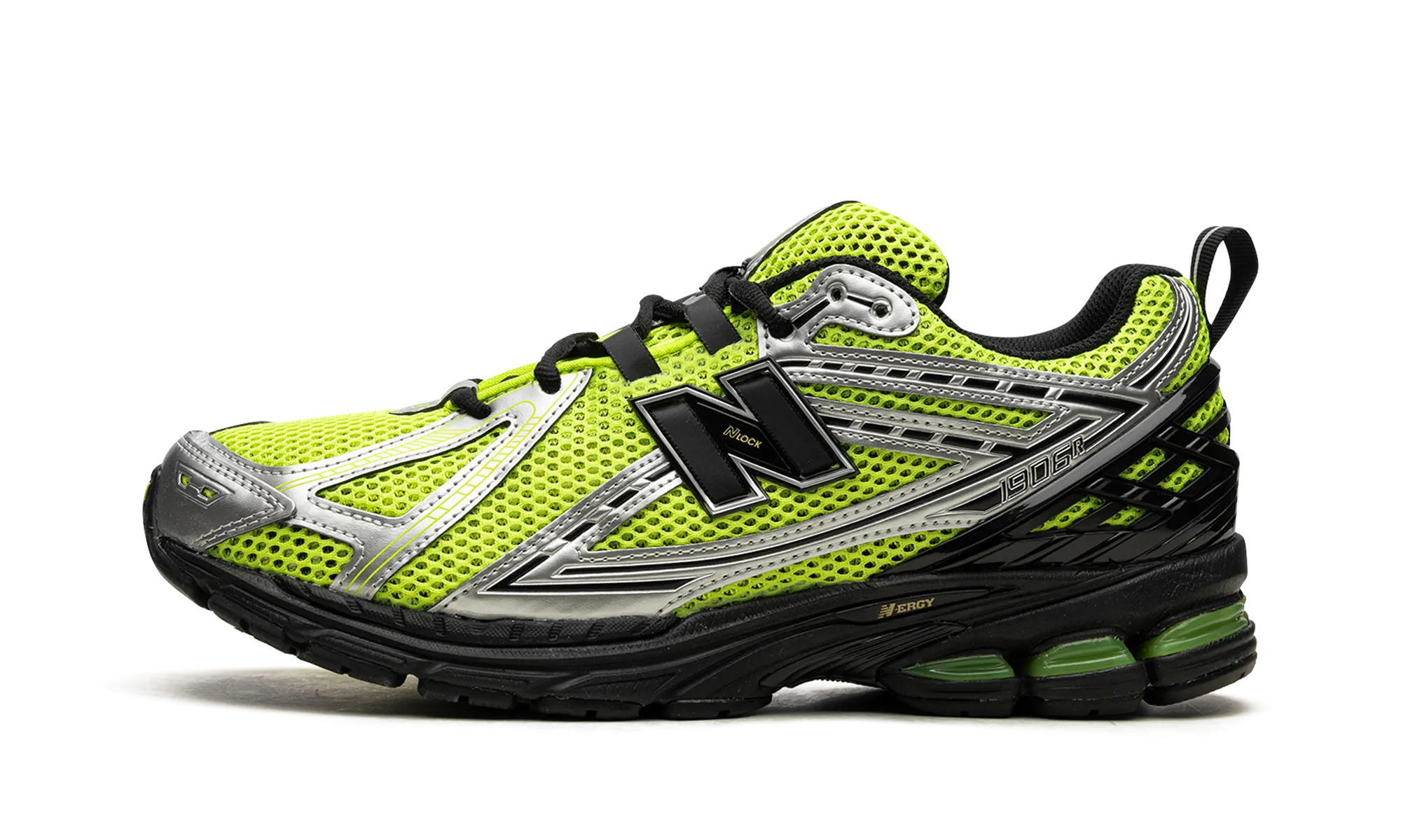 1906R "Volt / Black" running on a dirt path day - visibility shoes