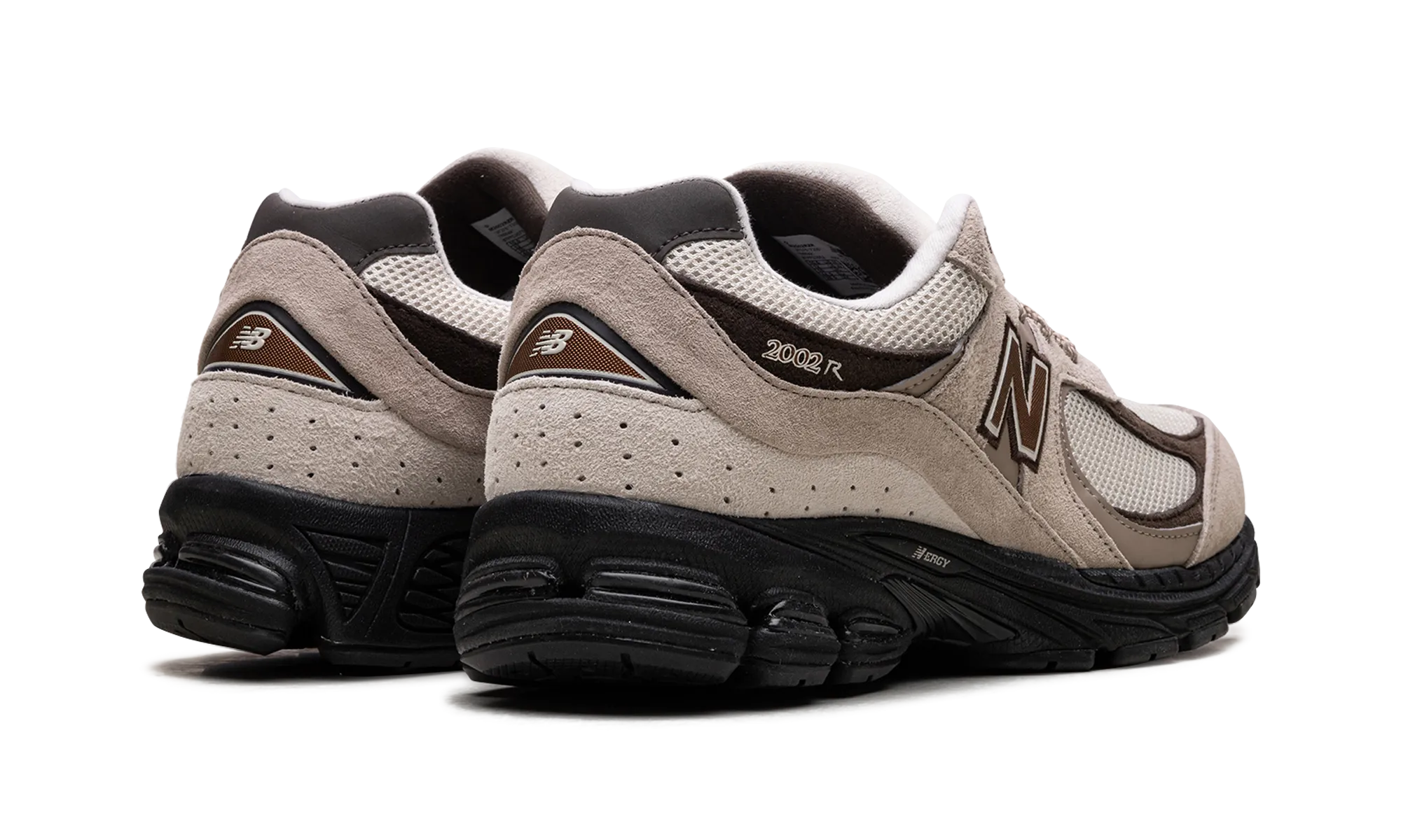 2002R "Cream Kumquat" Light Footed running on an outdoor track shoes