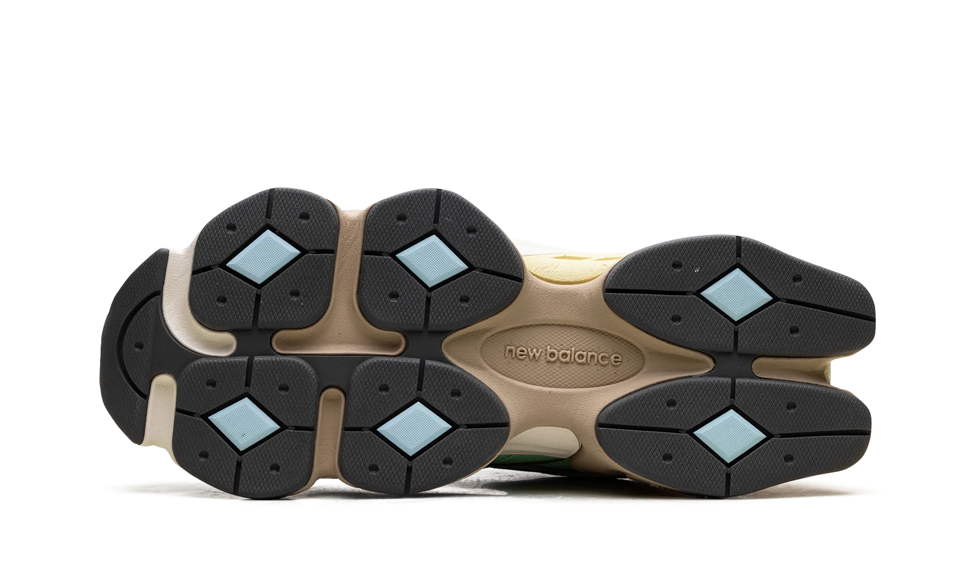 9060 "Sweetgrass Deep Ocean" running in single - lane tracks shoes snowy - day shoes