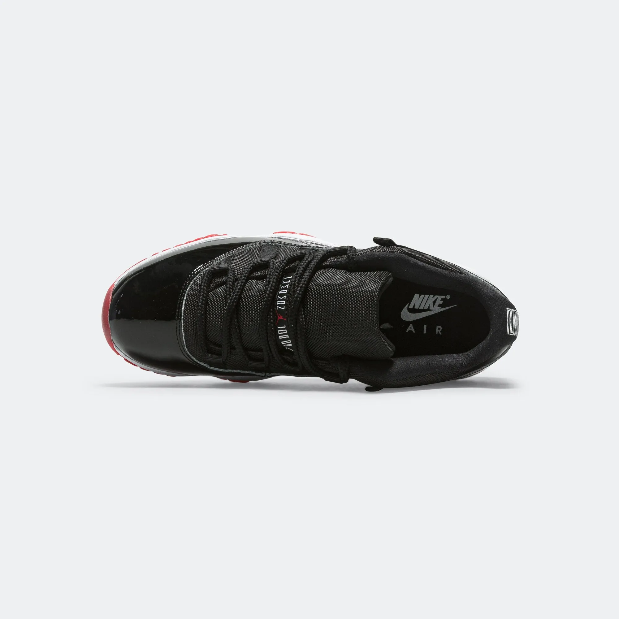 Adaptive cushioning Rubber Traction Air Jordan 11 Retro Low - Black/Varsity Red-White