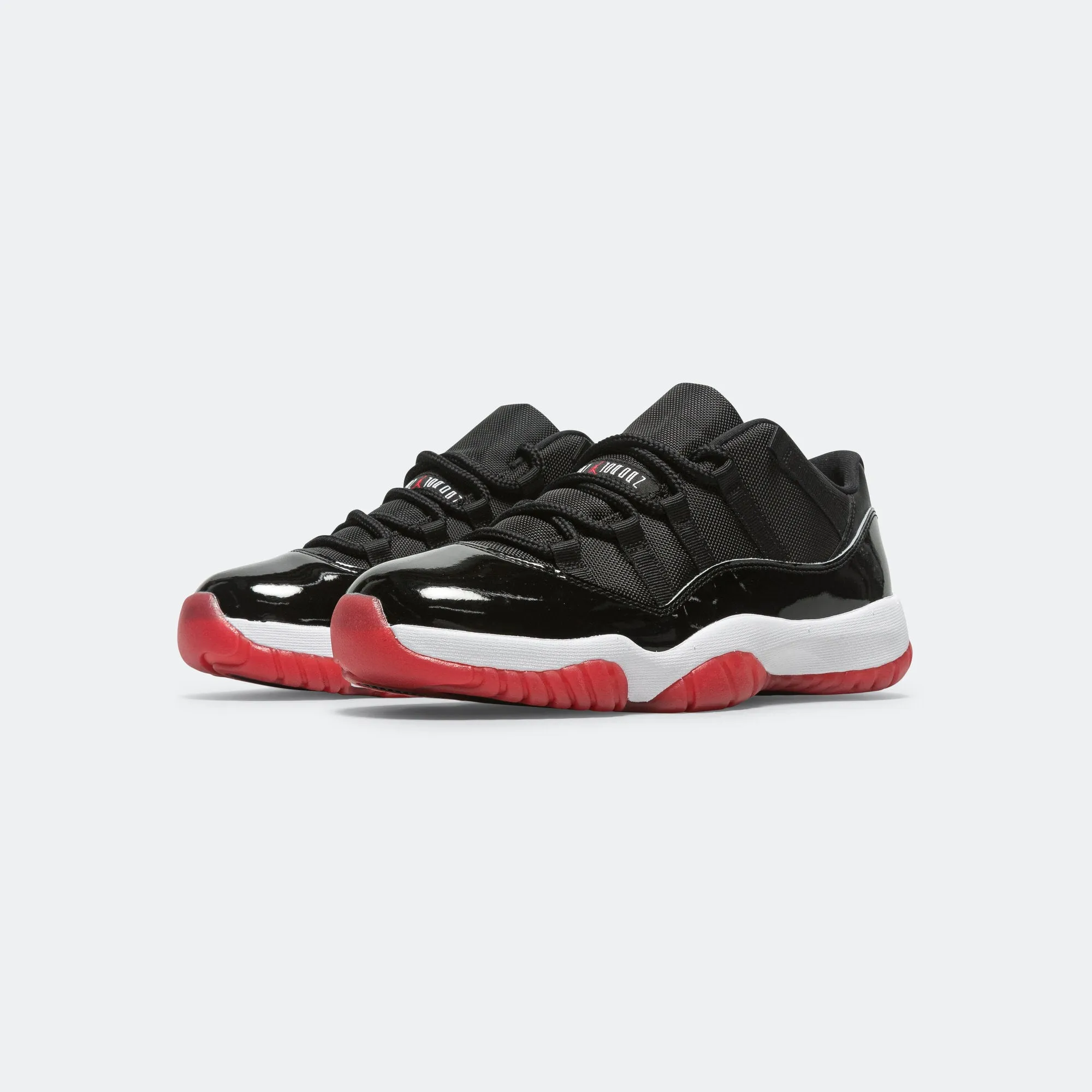 Dual Density Cushioning Air Jordan 11 Retro Low - Black/Varsity Red-White