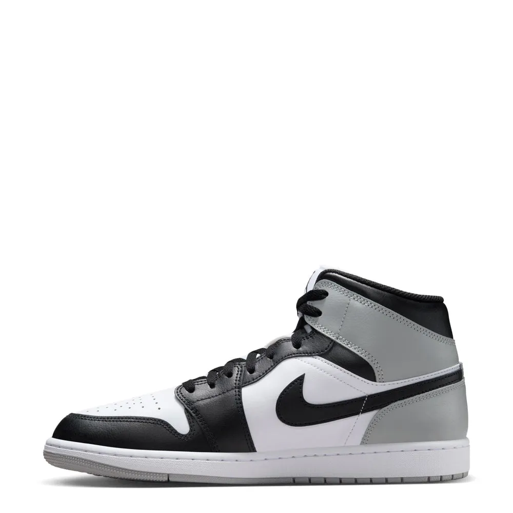 AJ 1 Mid - Mens running with a water bottle