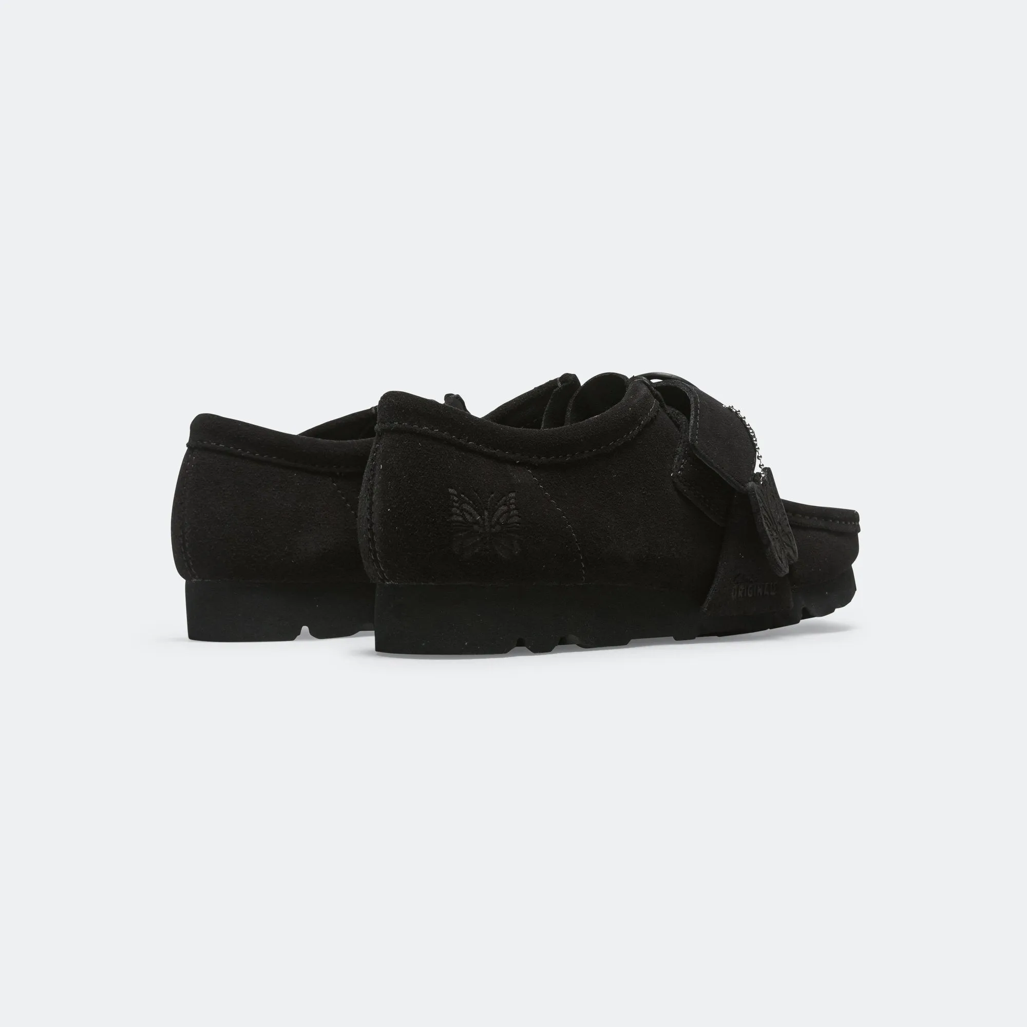 WallaStrap Low x Needles - Black Suede vibration damping Tuned Rocker Geometry