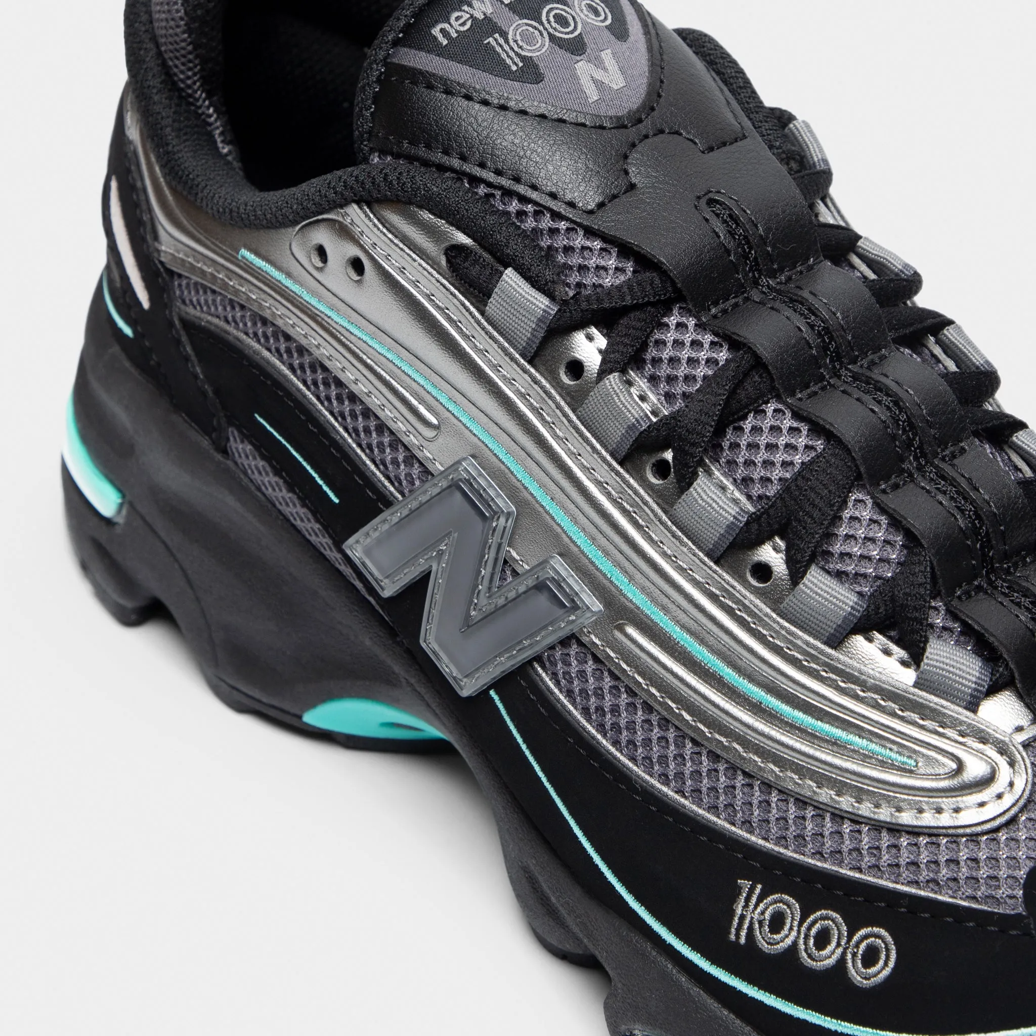 Field Power New Balance M1000 Black / Teal