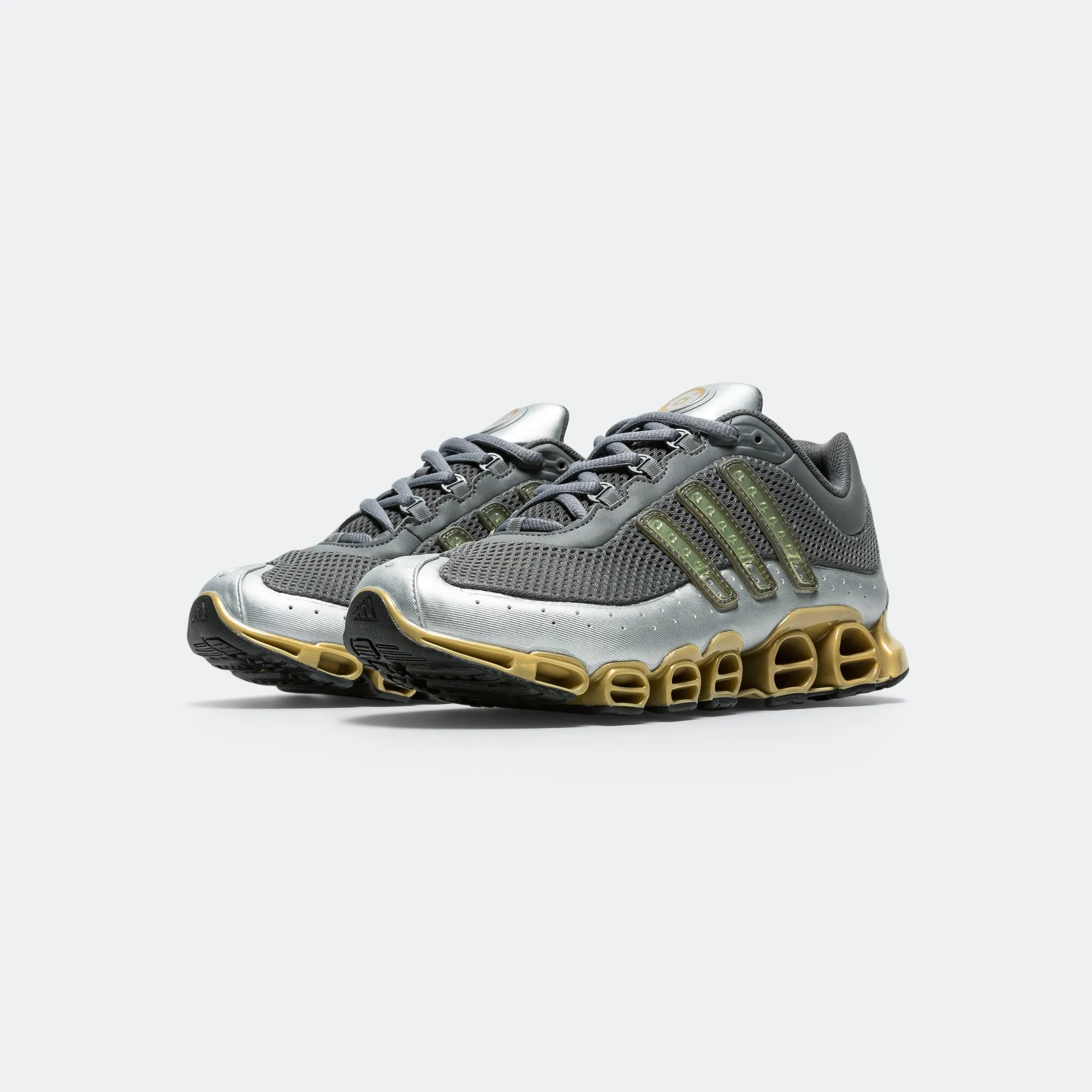 Megaride - Grey Four/Gold Metallic-Metallic Silver Shock Base Comfort Stretch