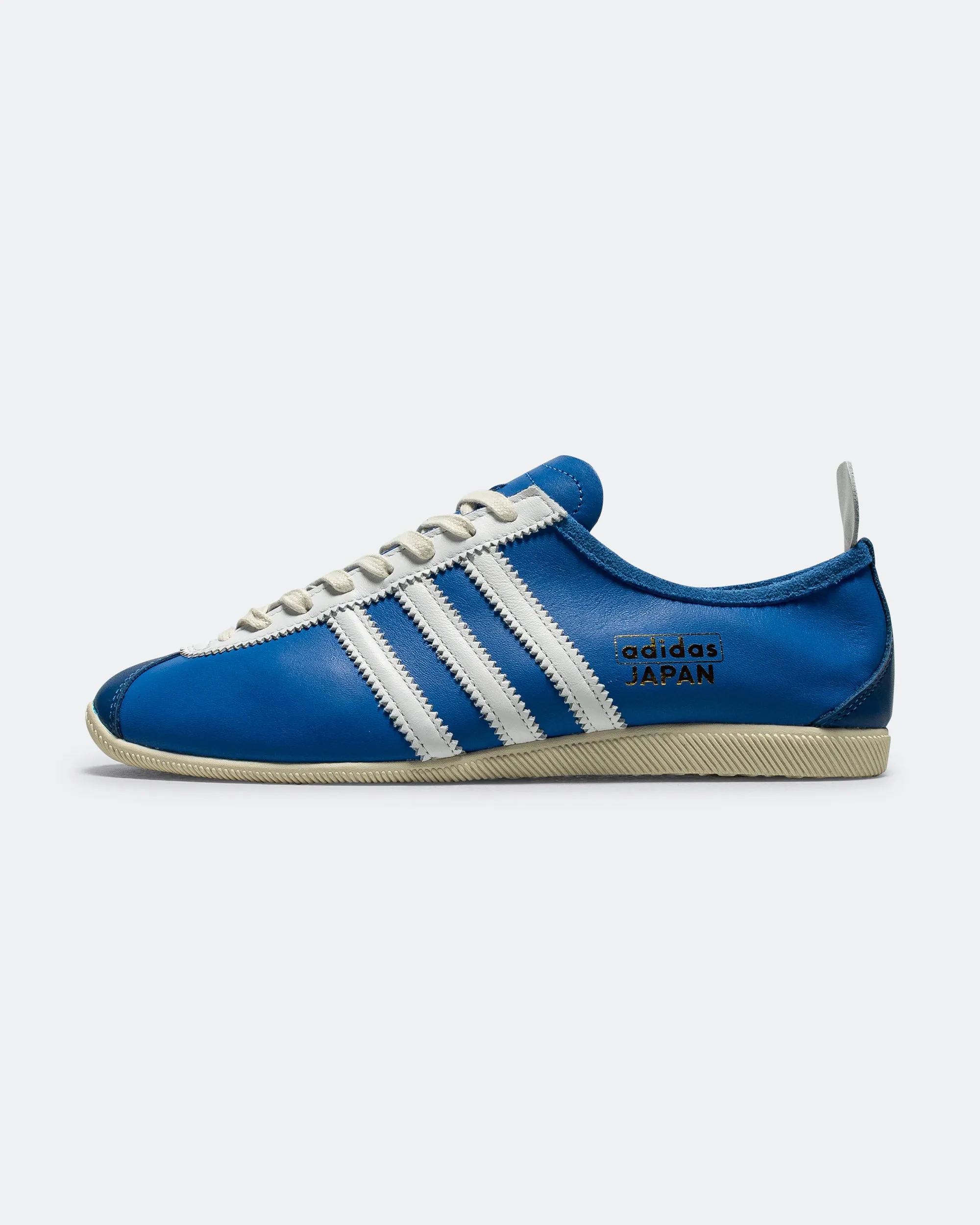 Japan - Bright Royal/Footwear White-Cream White Textured Outsole Pattern