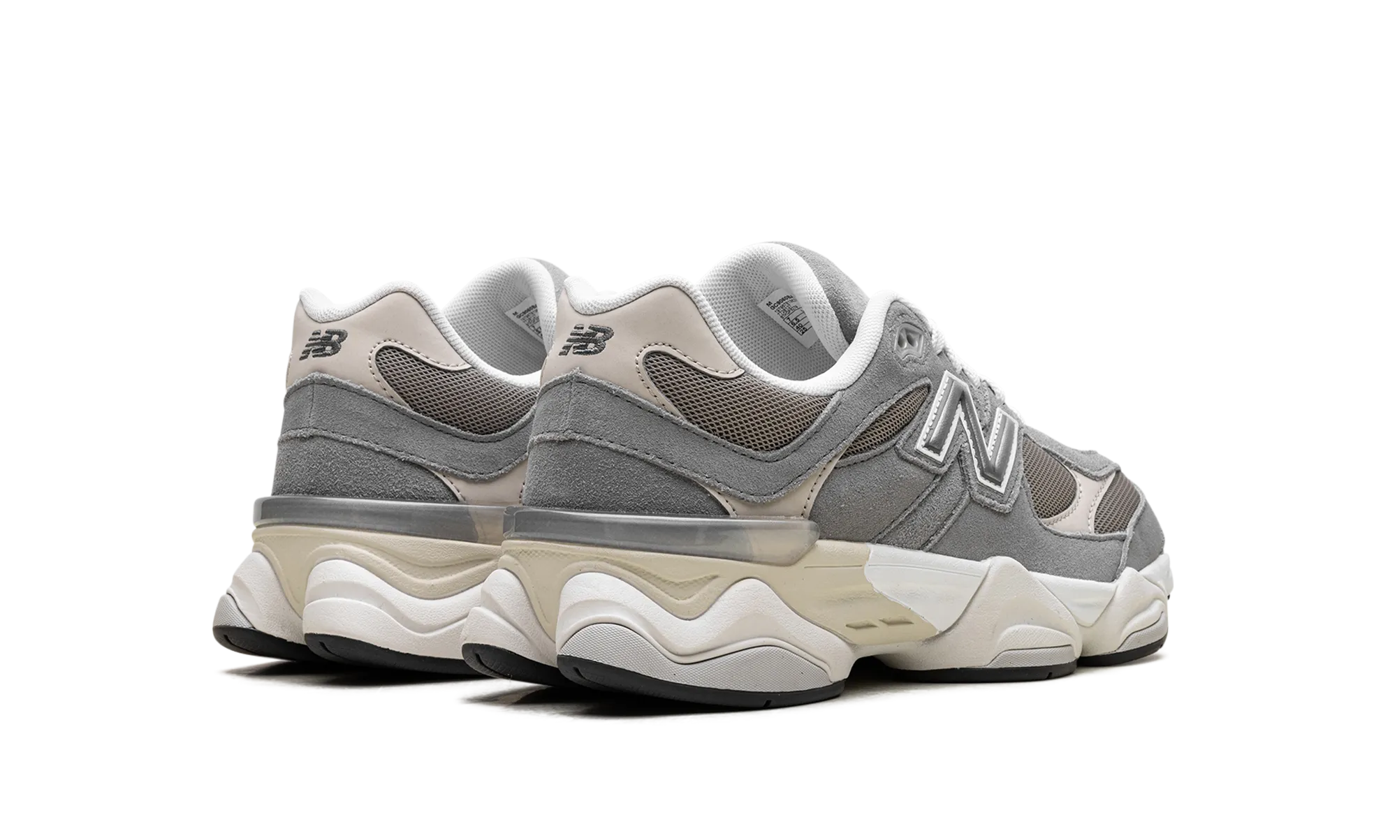 9060 GS "Grey Brown" running in a relay race store - brand shoes