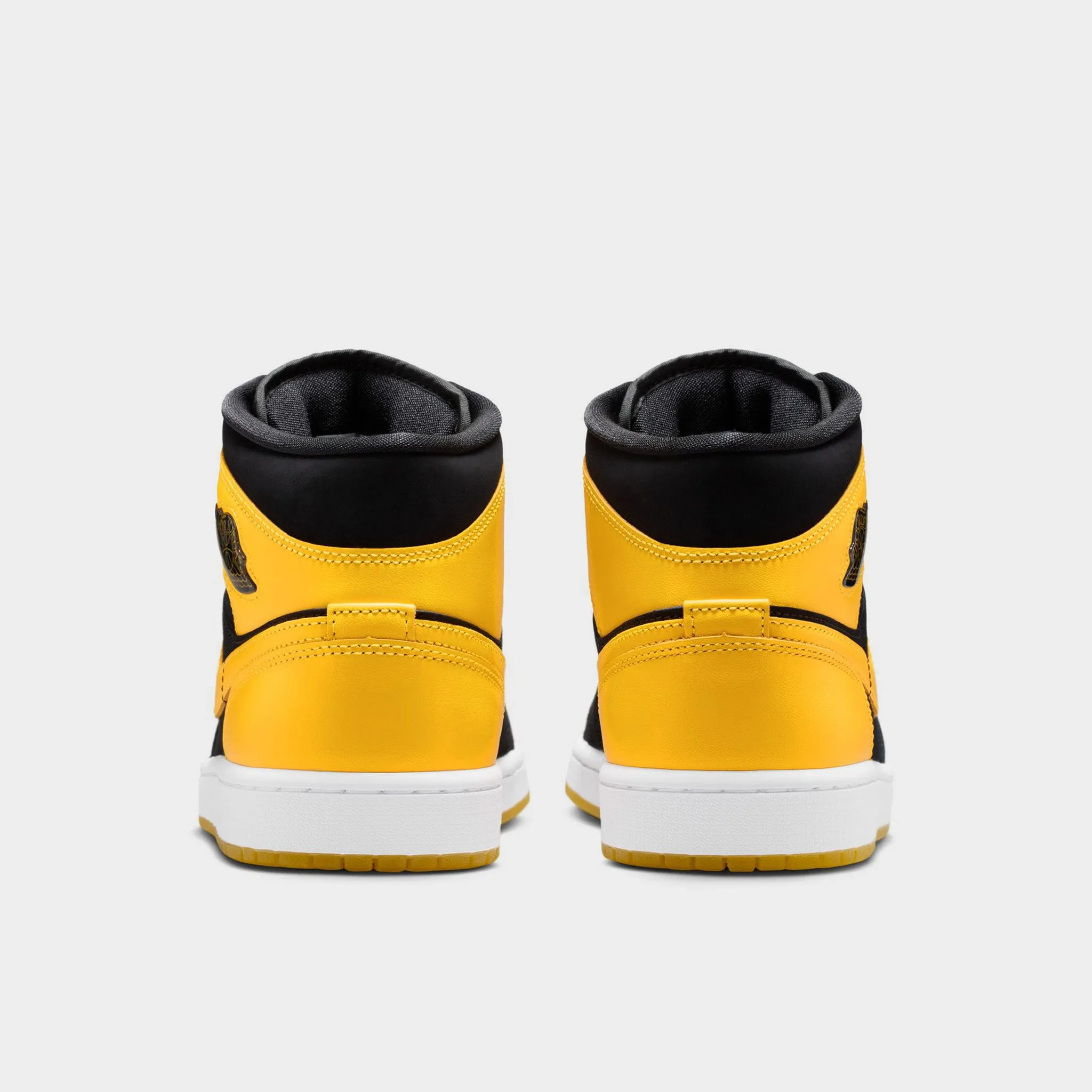 Jordan 1 Mid Black / Varsity Maize - White Soft outsole