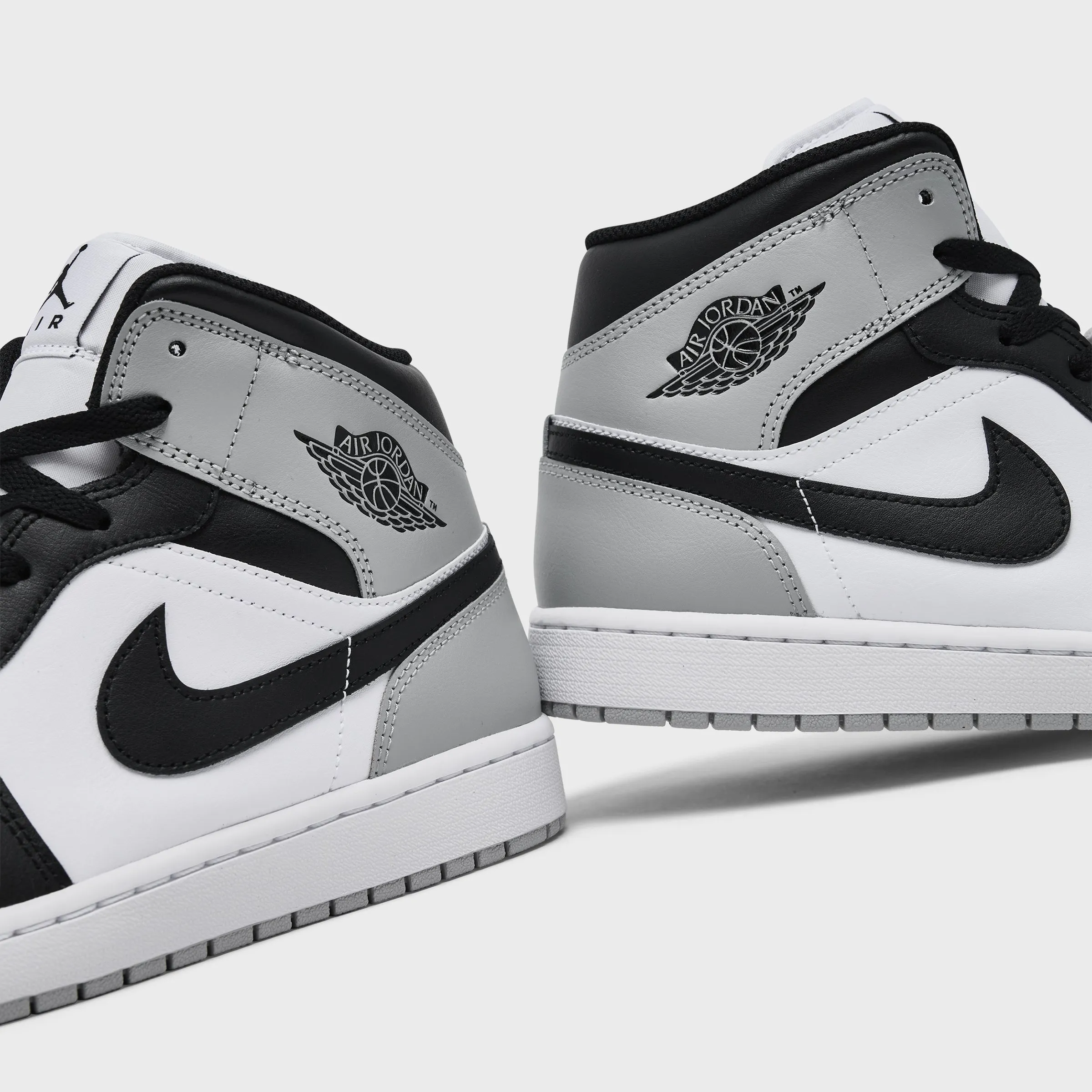 Sturdy Construction Jordan 1 Mid White / Black - Light Smoke Grey