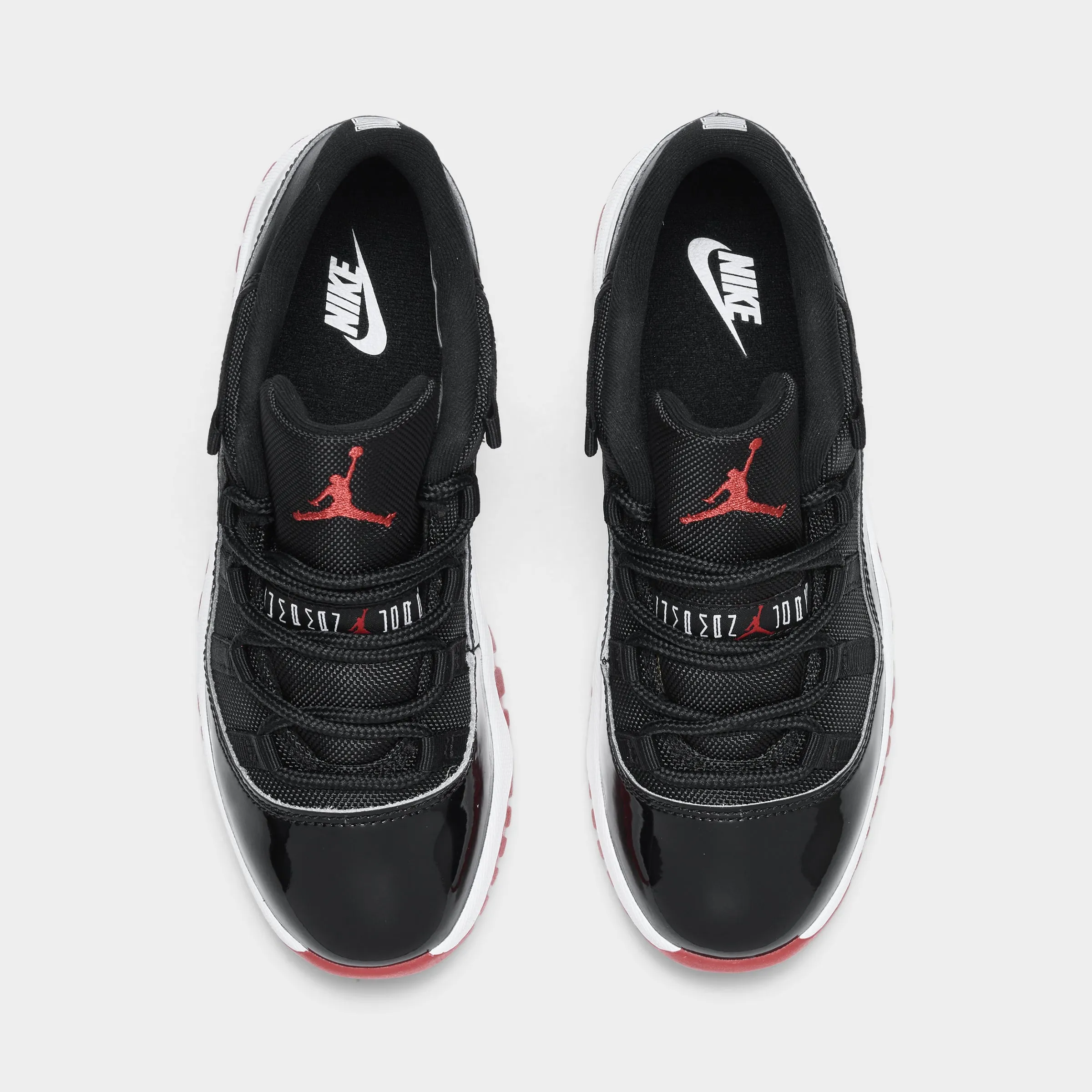Comfort Walk Corner Style Jordan 11 Retro Low PS Black / Varsity Red - White