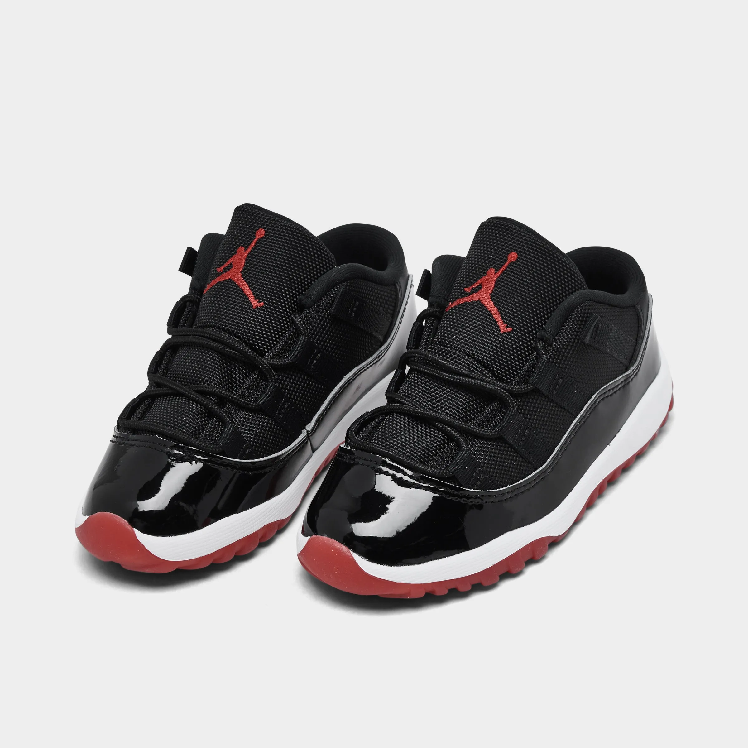 Jordan 11 Retro Low TD Black / Varsity Red - White Weekday Style