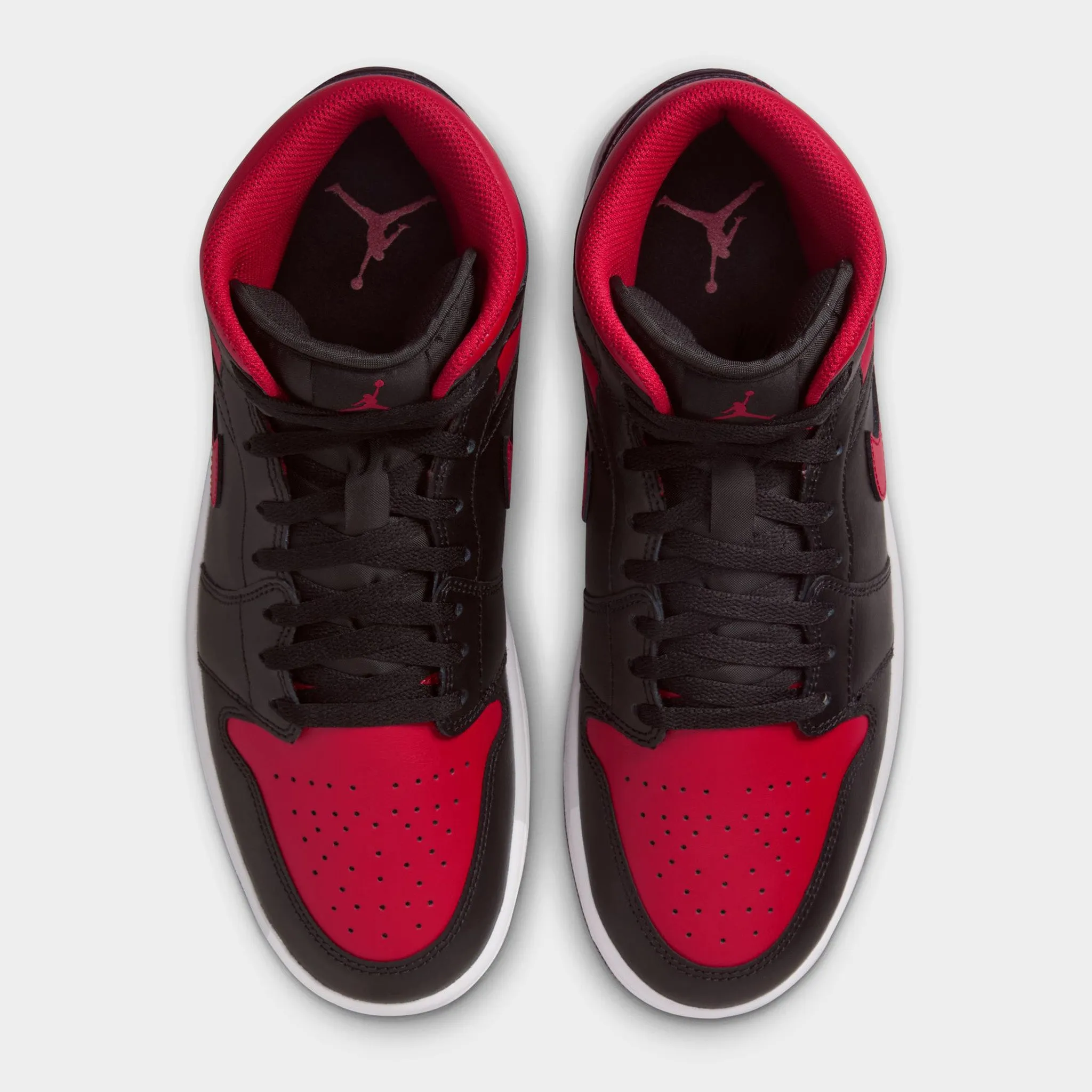 Jordan 1 Mid Black / Varsity Red - Summit White Relaxed Feel evening walk