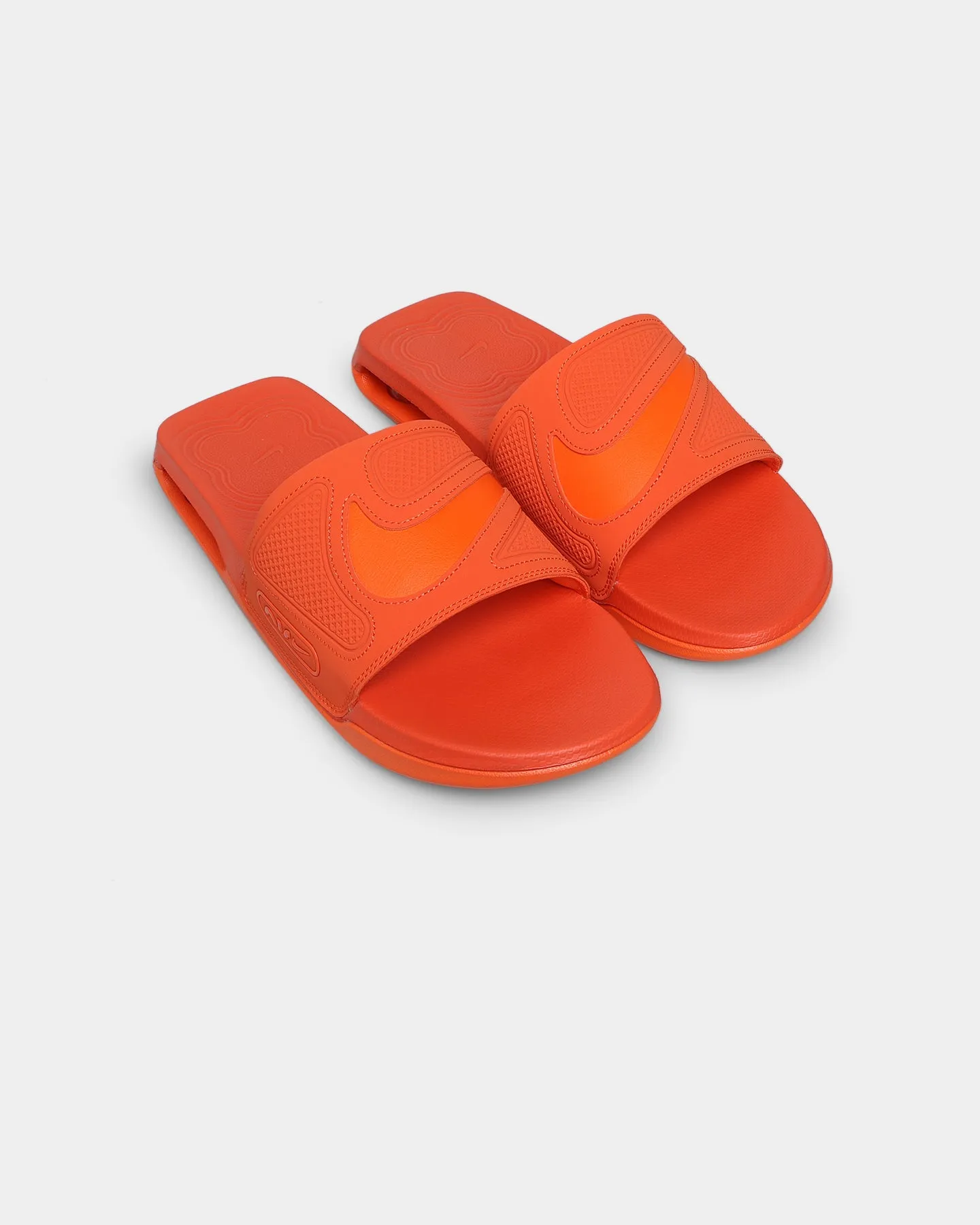Walking Nike Air Max Cirro Slides Safety Orange