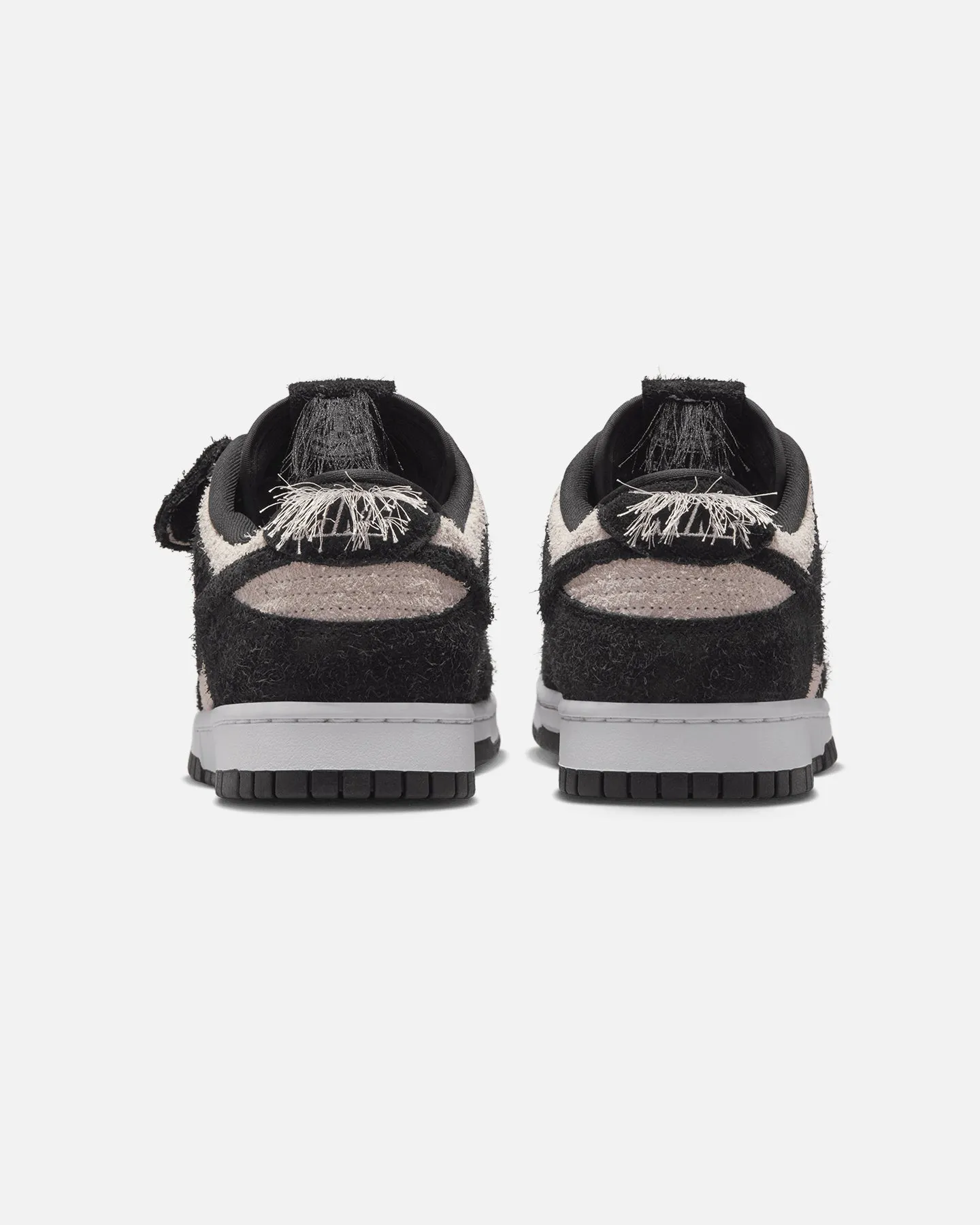 Stride Bold Nike Dunk Low Retro "Panda" White/Black