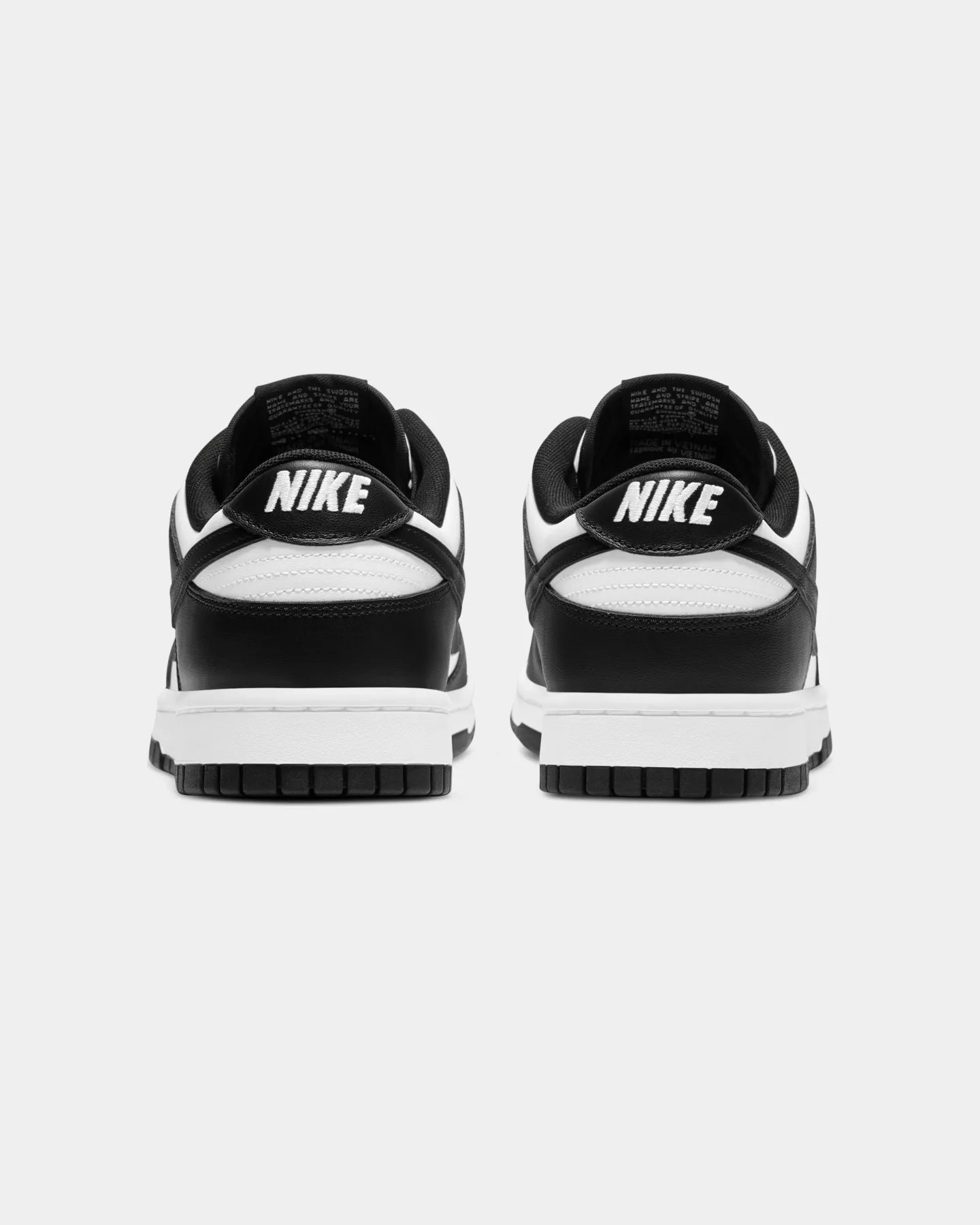 Nike Dunk Low Retro "Panda" White/Black Desert Cool Injury Safe