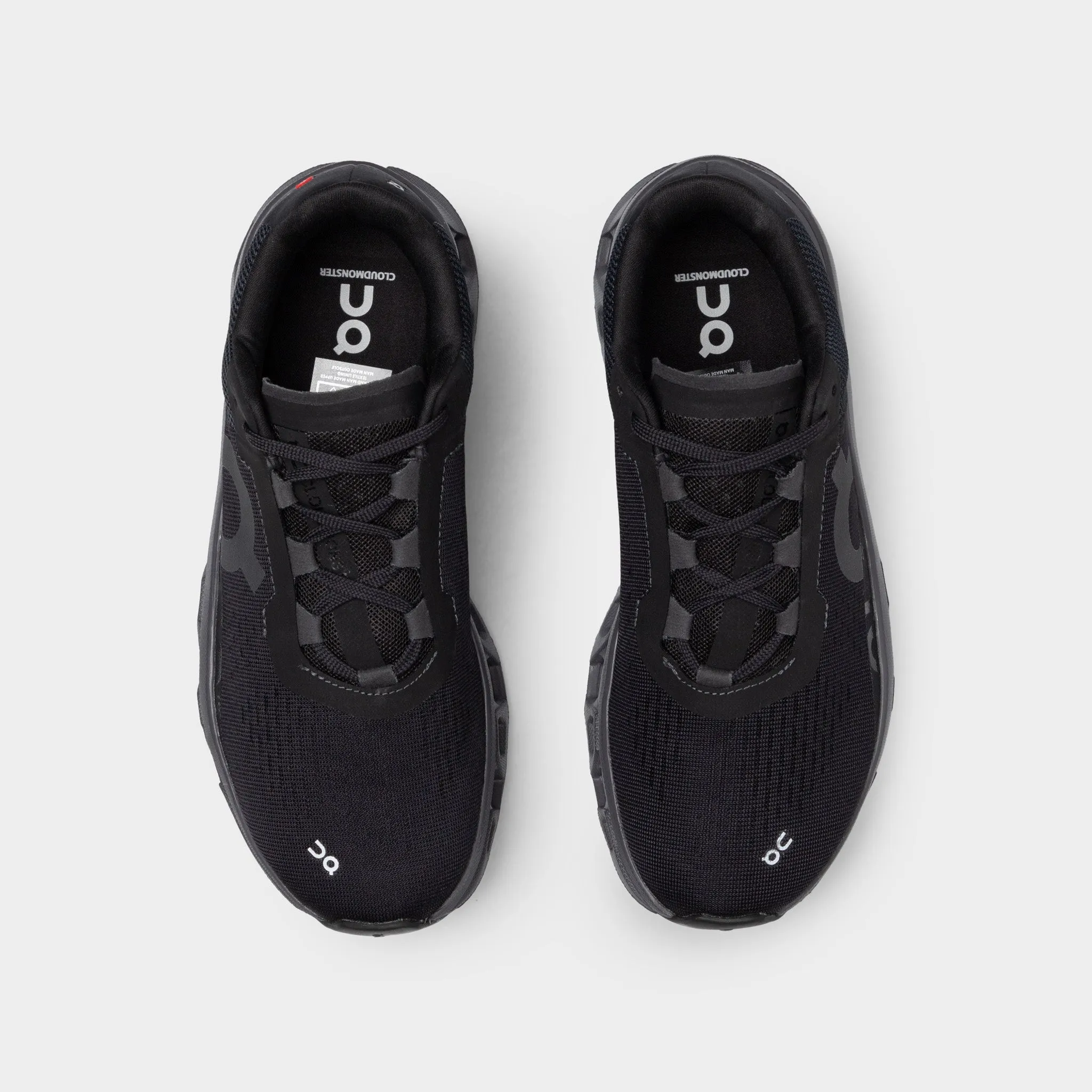 On Women's Cloudmonster Black / Magnet Free Movement