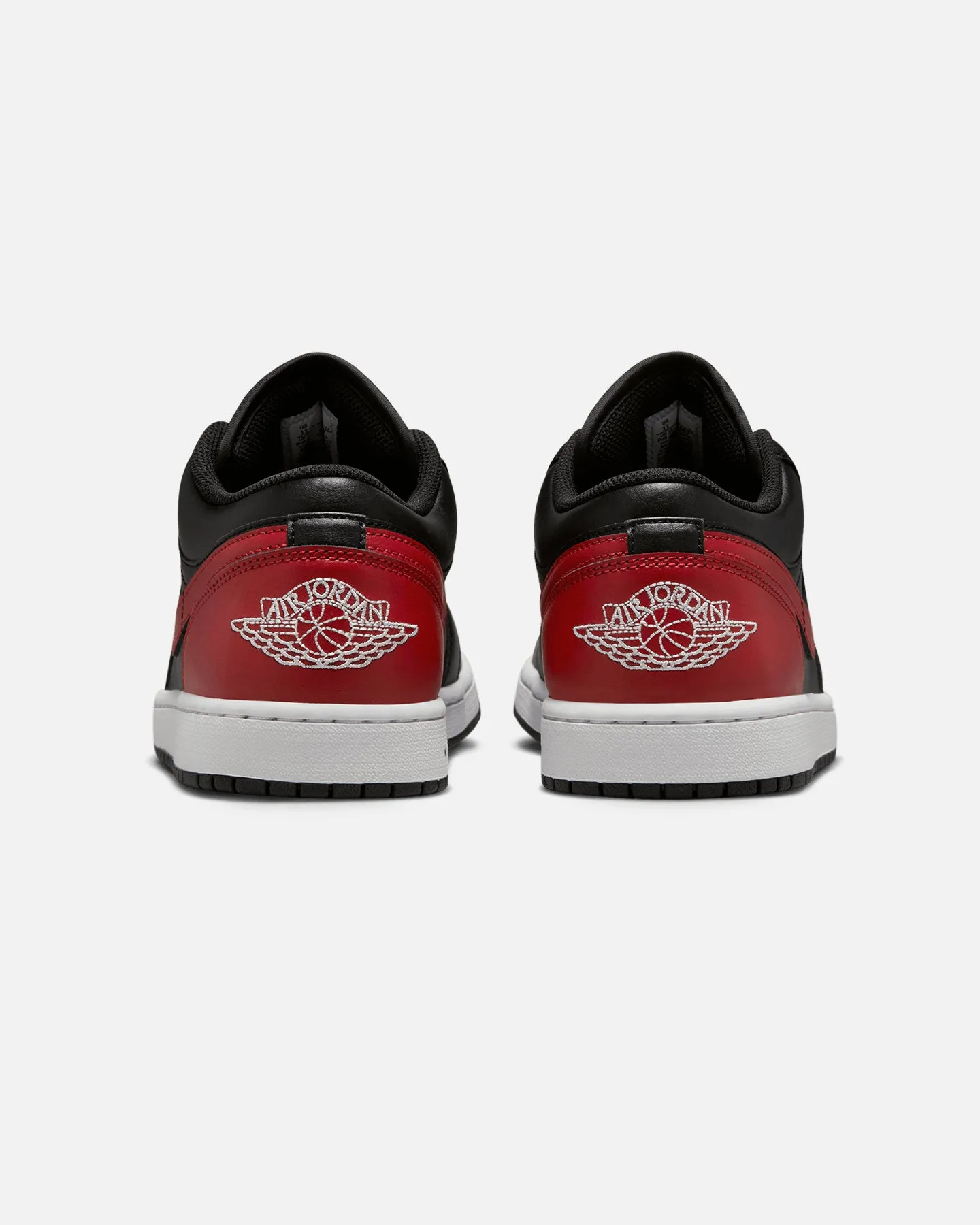 Jordan Air Jordan 1 Low "Bred" Black/Varsity Red-Summit White Story Glow Garden Walk