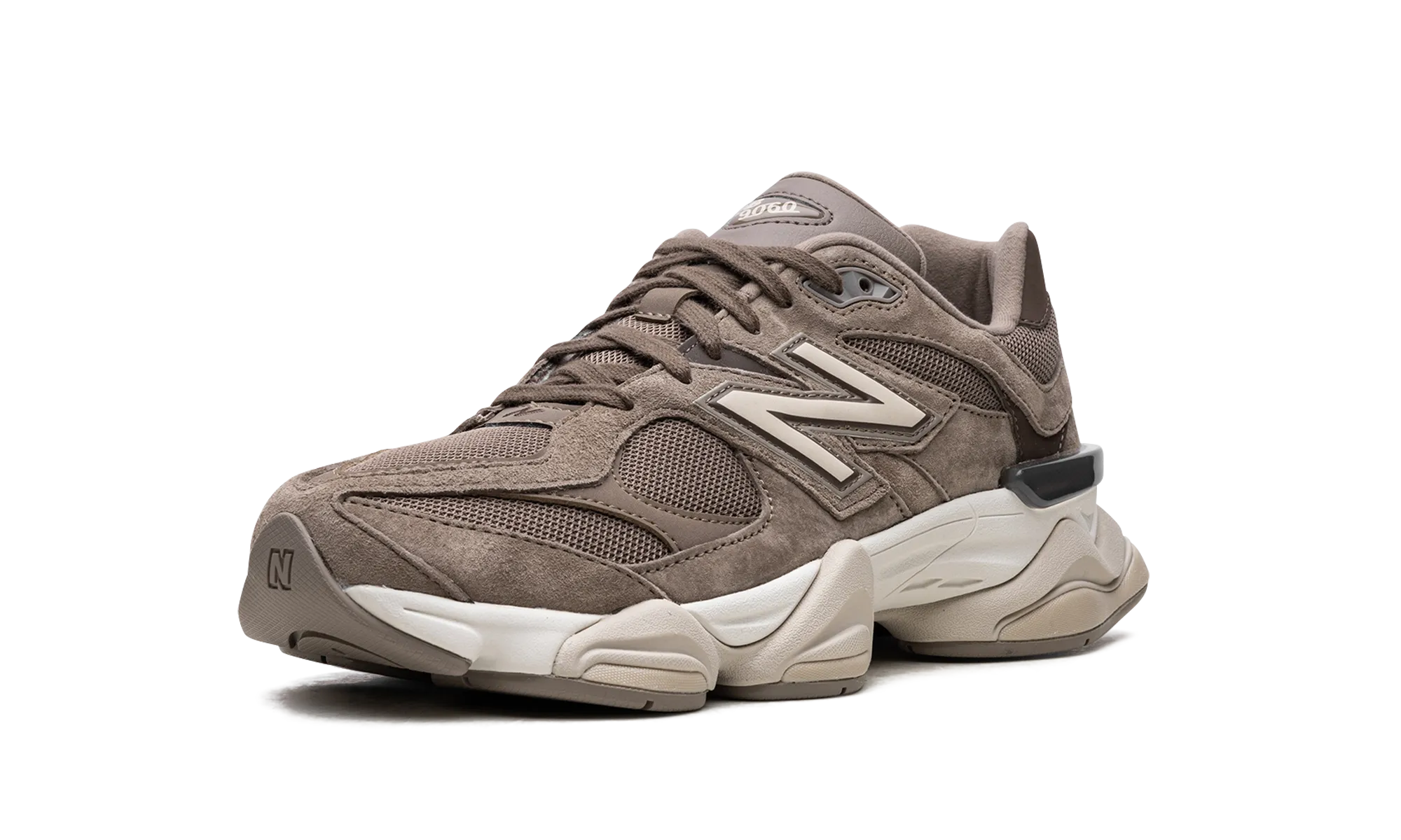 9060 "Mushroom Brown" running in a mud pot area shoes