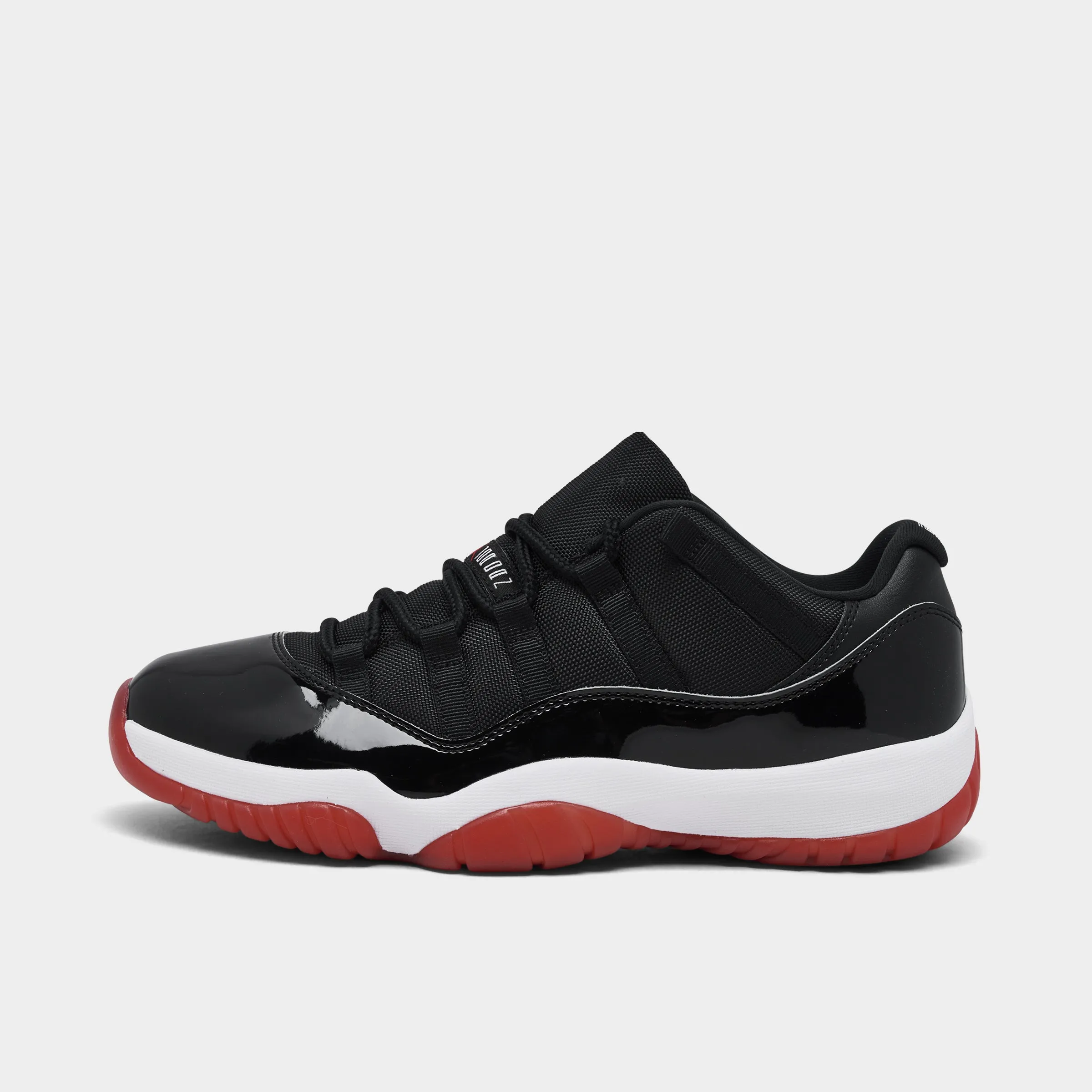 Jordan 11 Retro Low Black / Varsity Red - White Light Journey