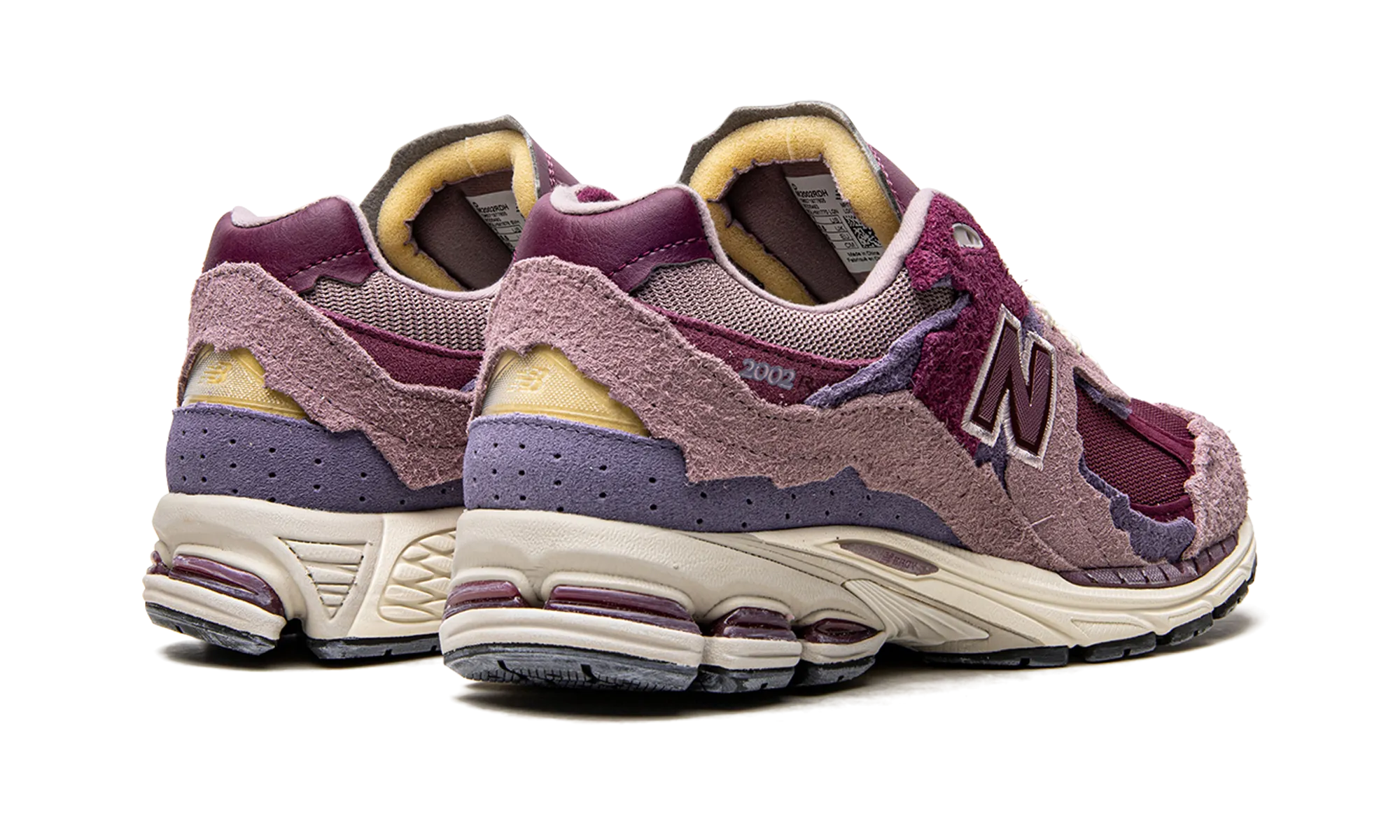 2002R "Protection Pack - Violet" running in a volcanic area shoes