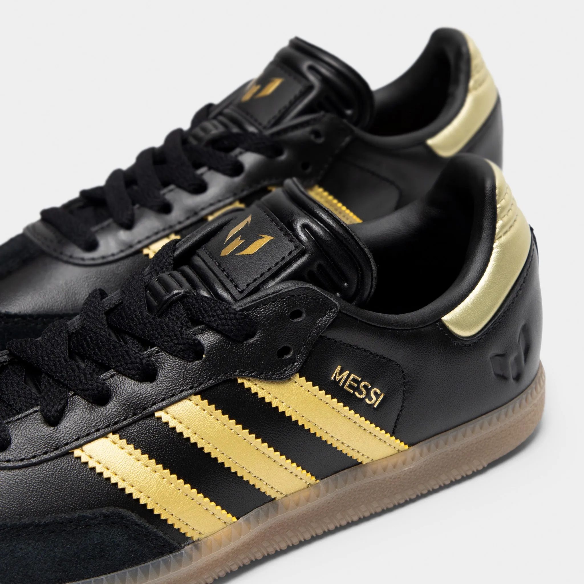 Padded collar Scenic Step adidas Juniors' Samba Messi Core Black / Gold Metallic - Gum