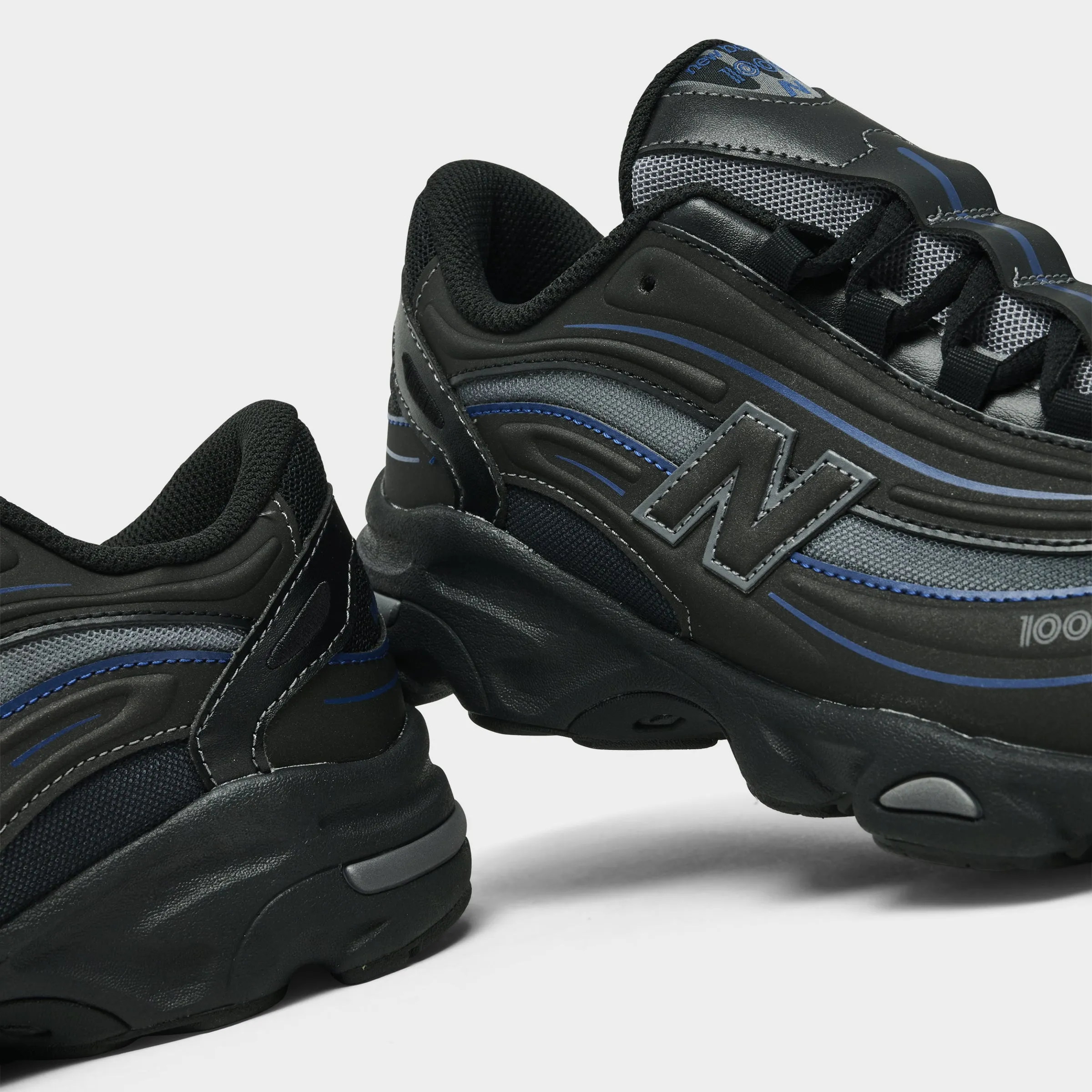 New Balance Juniors' 1000 Black / Galaxy Blue Fast Go