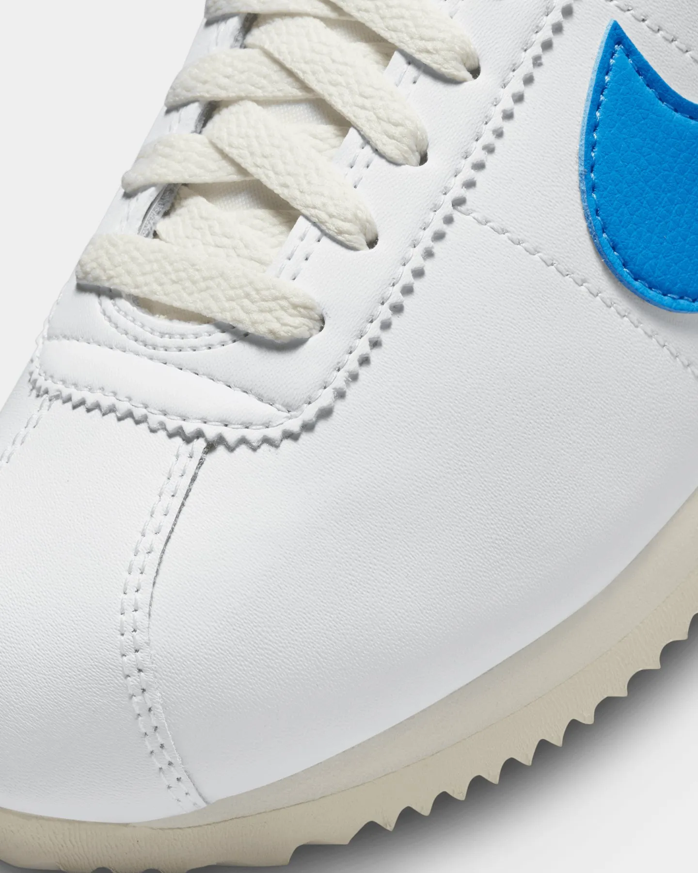 purest packability - level Nike Women's Cortez White/University Blue