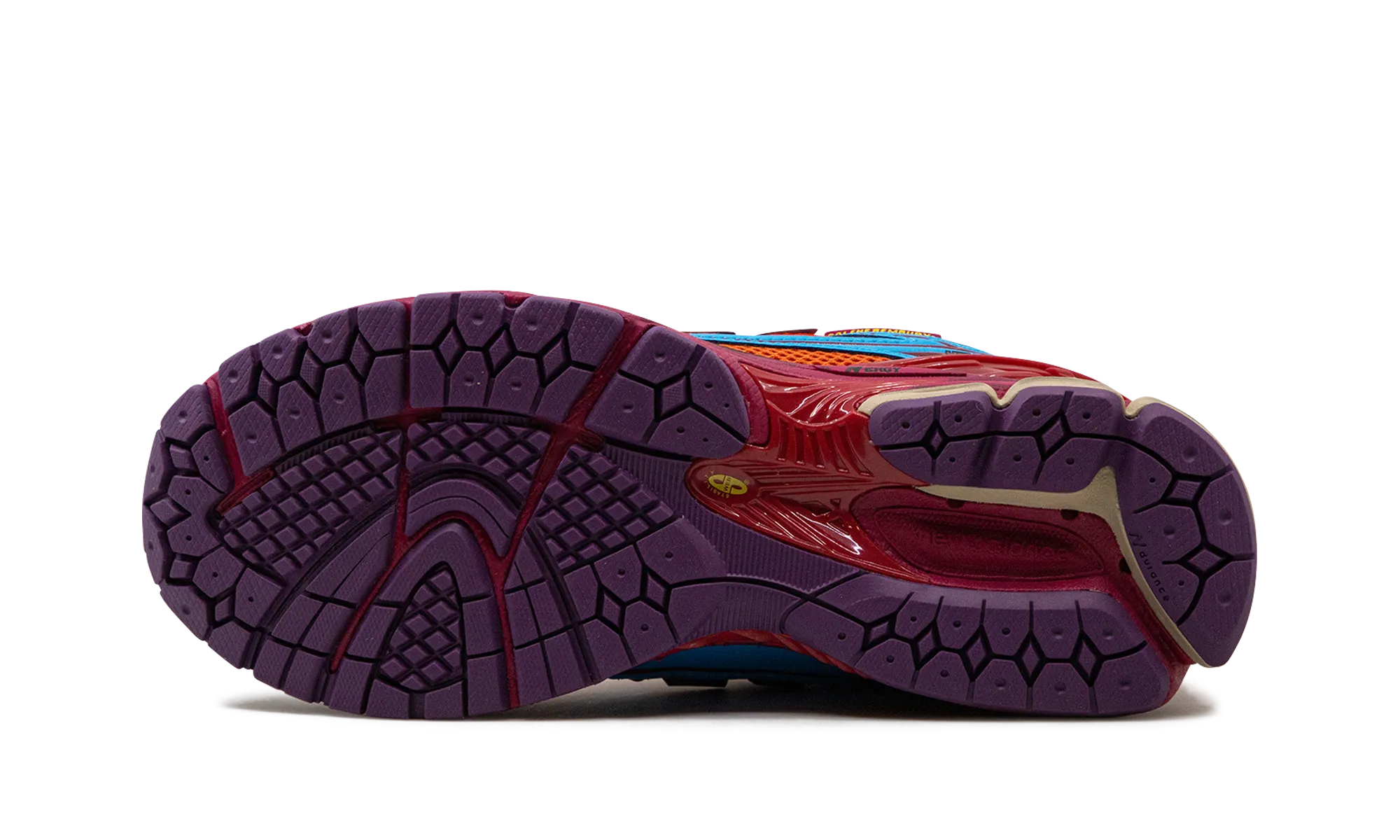 1906R "Salehe Bembury - Heat Be Hot - Magma" running in a fen area shoes weekday shoes