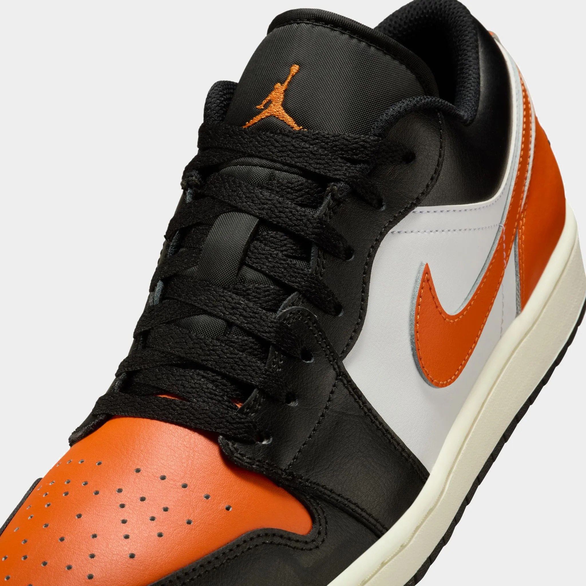 Jordan 1 Low Black / Starfish - White - Sail Stud Cool