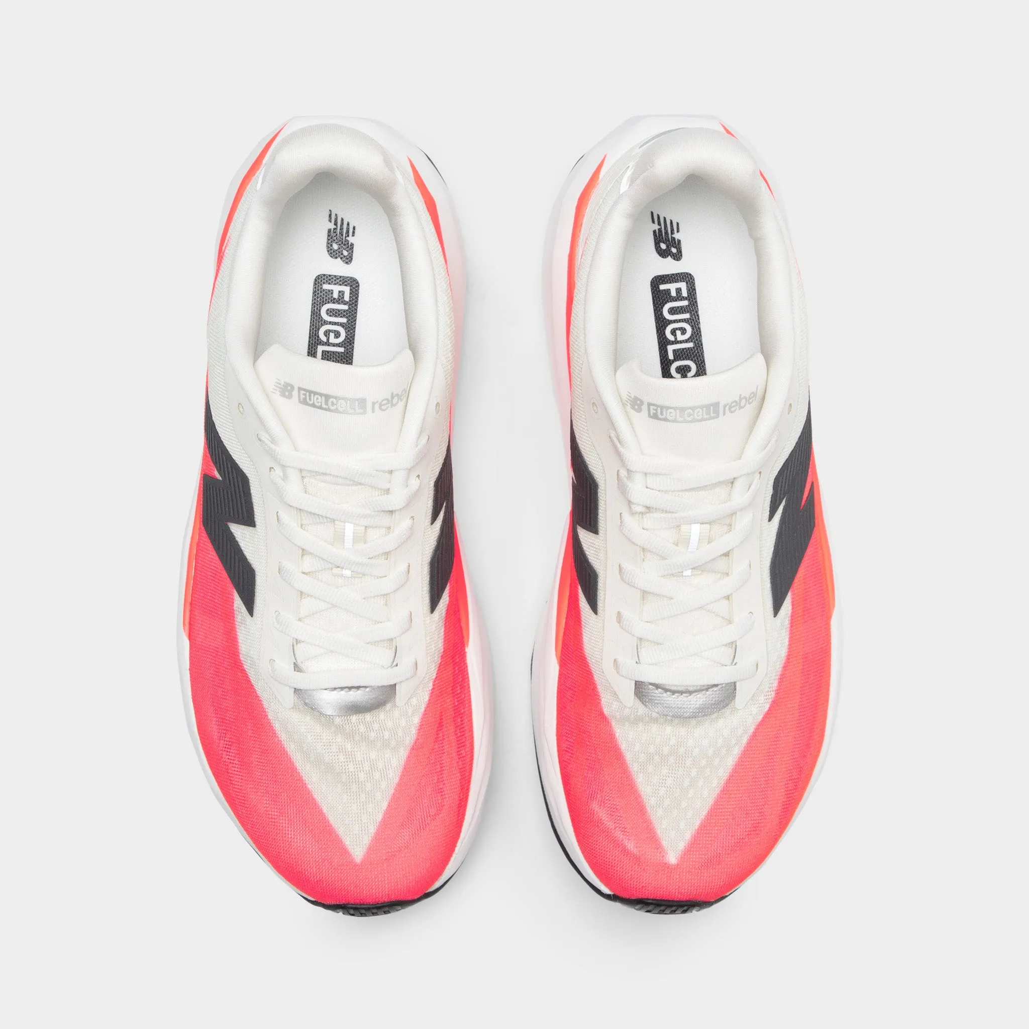 New Balance FuelCell Rebel v5 White / Pink photo shoot