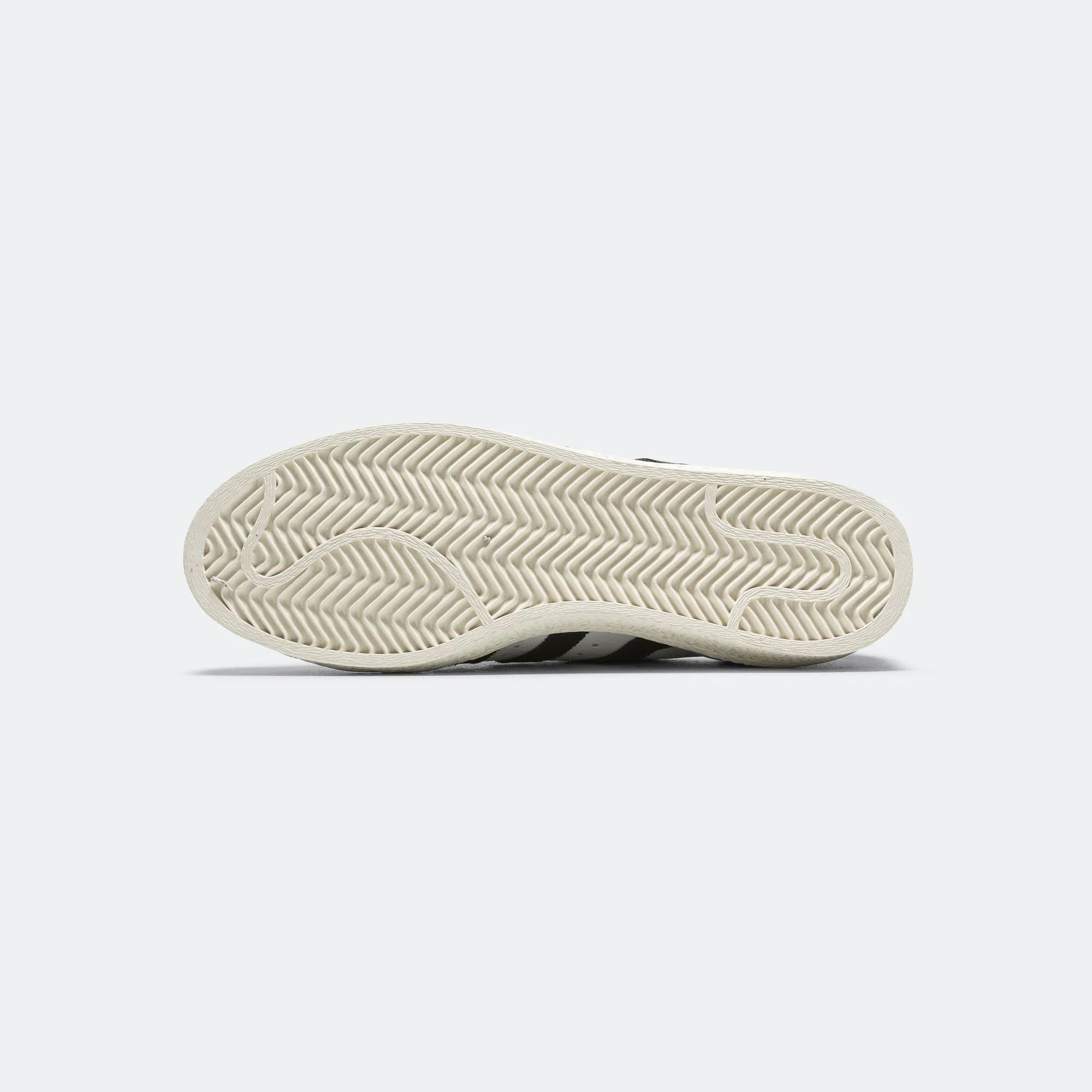 Superstar 82 - Footwear White/Core Black-Off White Dynamic Traction Pattern