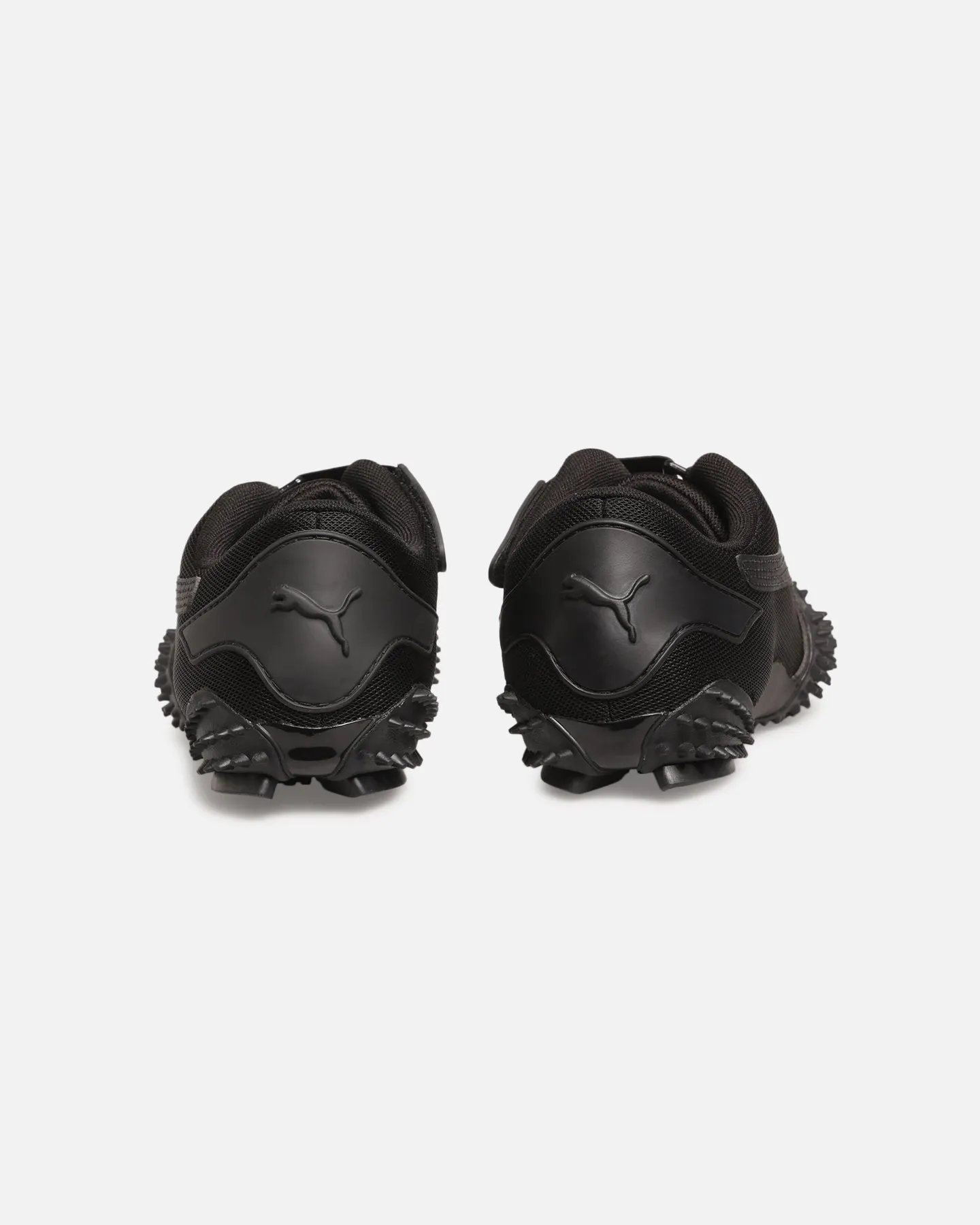 Puma Mostro OG Prime Black/Black Form Ease warm glow