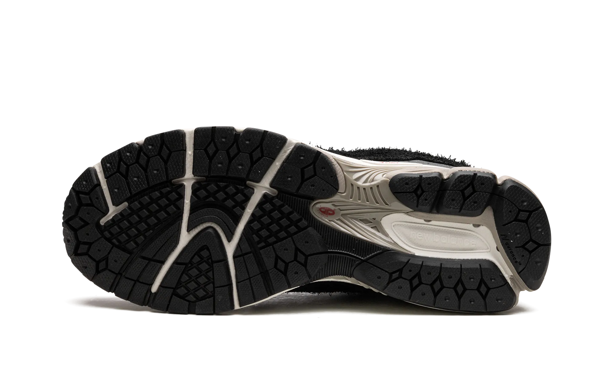 2002R "Protection Pack - Black / Grey" running with backpack shoes
