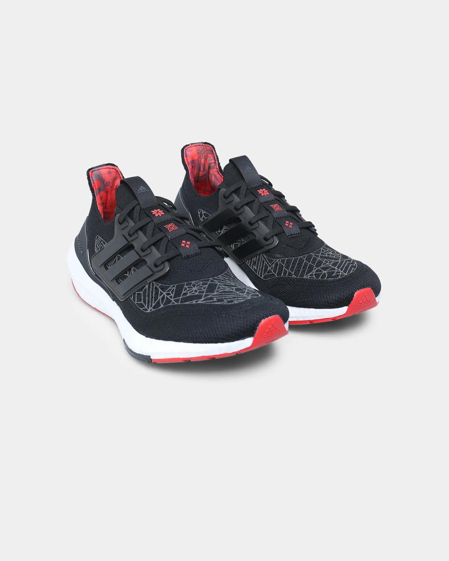 group walk Adidas Ultraboost 21 CNY Core Black / Scarlet